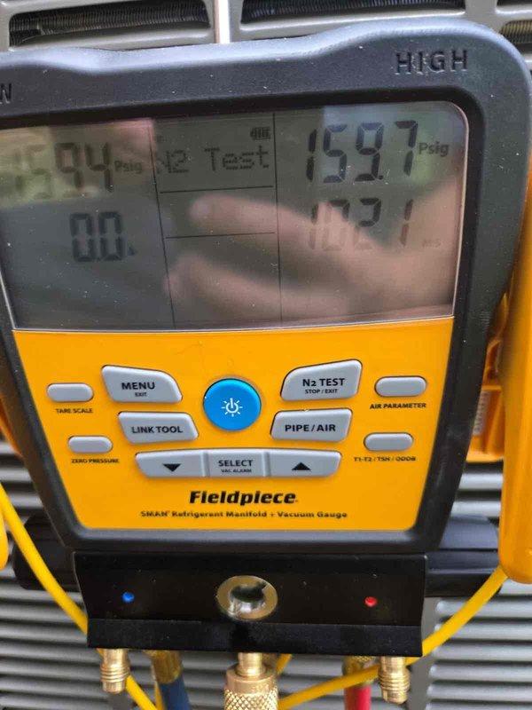 Completed installation of 2.5-ton air conditioning unit with matching evaporator coil in rear yard location. Performed mechanical installation, reconnected refrigerant lines, and verified system pressures using digital manifold gauges, confirming proper operating parameters and system integrity upon completion.