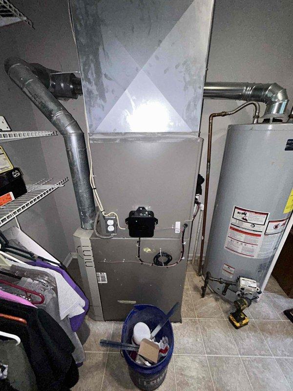 Completed final warranty inspection and testing of attic HVAC installation. Performed nitrogen pressure test and refrigerant system diagnostics using digital manifold gauge, verifying system integrity and proper pressurization. Confirmed furnace and water heater installations in mechanical room are operating within manufacturer specifications with all ductwork, venting, and utility connections properly secured and functional.