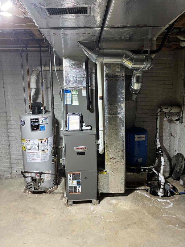 Conducted on-site assessment of existing Lennox HVAC system in basement mechanical room to provide replacement estimate. Customer requested Lennox equipment replacement for aging 8-10 year old air conditioning and furnace units. Documented current system configuration including furnace installation, ductwork layout, and exterior condensing unit location for accurate equipment sizing and replacement planning.