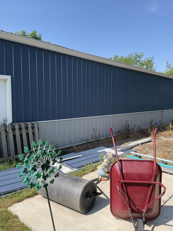 Conducted site assessment for new mini split installation in pole barn structure with metal siding. Evaluated exterior mounting locations, electrical access points, and optimal placement for indoor and outdoor unit components. Also provided estimate options for water heater replacement.