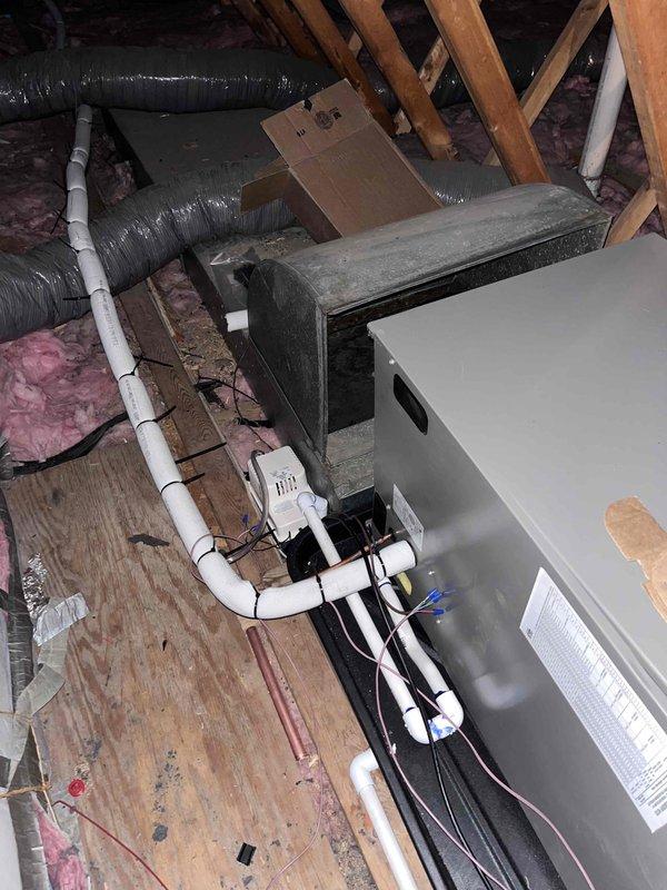 Successfully installed a 3.5-ton air handler unit in the attic space with complete electrical connections, refrigerant line sets, and condensate drainage system including pump assembly. All ductwork connections were completed using flexible metallic ducts, and the unit was properly mounted on a platform with adequate clearance for service access. The system was tested and reconnected to the existing outdoor AC unit, ensuring proper airflow and drainage functionality.
