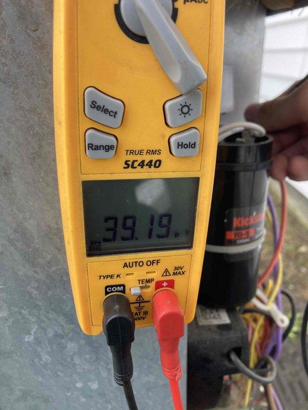 Completed Club AC10-2 preventive maintenance agreement visit on air conditioning system. Performed comprehensive inspection of blower assembly, noting light dust accumulation on blower wheel blades but overall satisfactory operation. Tested electrical components using digital multimeter, recording 39.19 volts at capacitor terminals, confirming proper voltage supply and capacitor functionality within manufacturer specifications. All system components operating normally with no deficiencies requiring immediate attention.