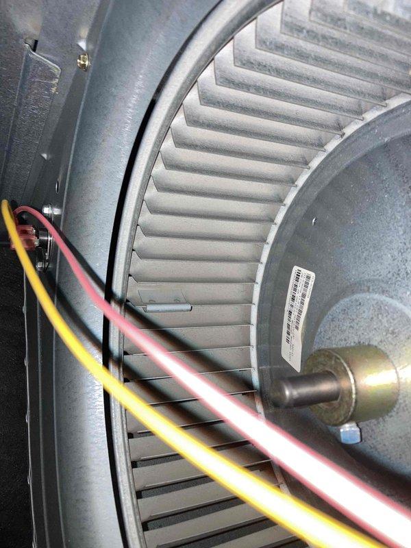 Performed routine preventative maintenance on residential HVAC system per agreement visit. Conducted electrical diagnostics on blower motor assembly using digital multimeter, verifying proper voltage readings and motor operation. Inspected squirrel cage blower wheel, motor wiring connections, and associated electrical components. All systems tested and found operating within normal parameters with no issues identified.