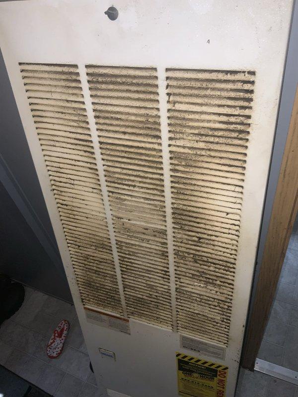Responded to no-cool complaint on 10+ year old HVAC system with reported blower malfunction. Upon inspection, found heavily soiled air return grille and dirty air filter restricting airflow to the system. Replaced clogged filter and documented conditions for maintenance records.