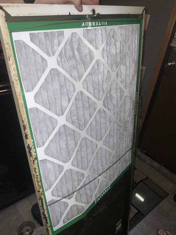 Responded to no-cool complaint on 10+ year old HVAC system with reported blower malfunction. Upon inspection, found heavily soiled air return grille and dirty air filter restricting airflow to the system. Replaced clogged filter and documented conditions for maintenance records.