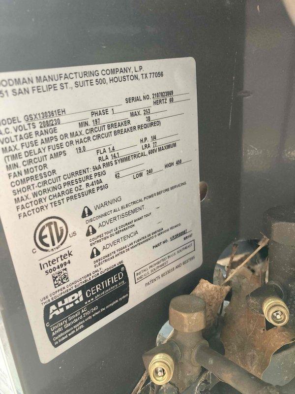 Completed scheduled AC club maintenance visit on Goodman GSX130361EH condensing unit. Performed comprehensive system inspection including visual examination of electrical components, refrigerant line connections, and service valves. Documented equipment nameplate data and photographed key components showing normal operational wear on brass fittings and copper refrigerant lines with minor surface oxidation. All accessible components inspected and found within acceptable operating parameters for continued service.