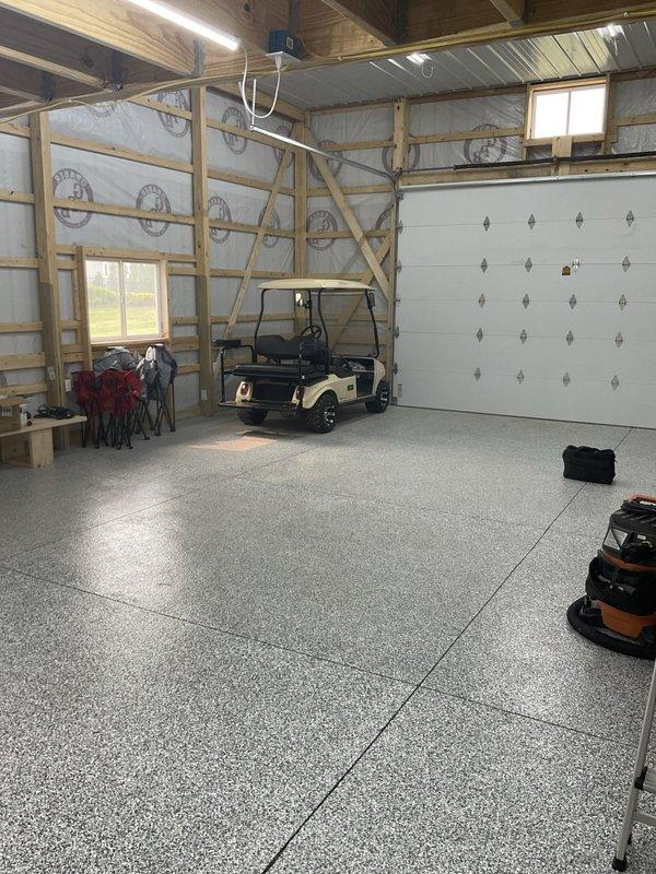 Provided estimate for new HVAC system installation in detached barn structure. Assessed barn interior with exposed wooden framing, electrical panel, and finished epoxy flooring to determine equipment placement and ductwork routing requirements. Recommended appropriate cooling system sizing and configuration for the workshop space to ensure adequate climate control for the structure.