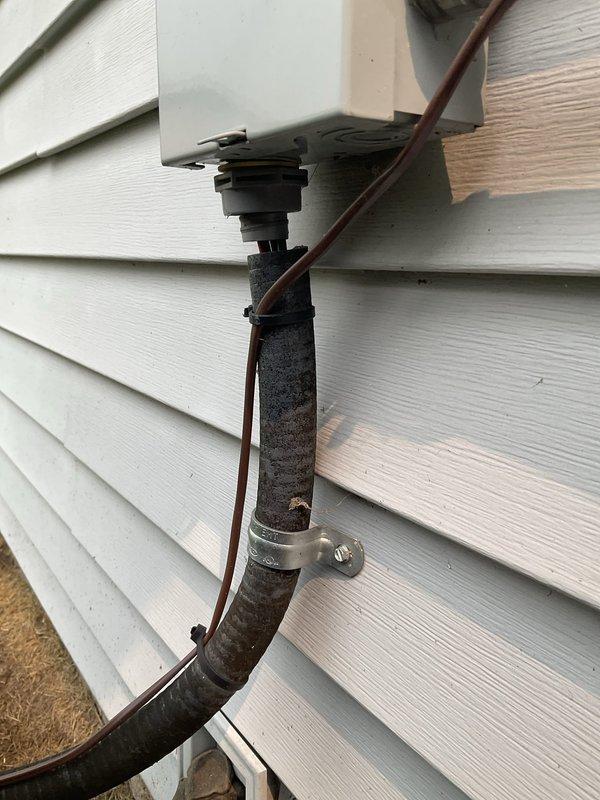Responded to no cooling complaint on residential air conditioning system. Performed visual inspection of outdoor condensing unit, noting accumulated dirt, debris, and spider webs around electrical connections and components. Electrical disconnect switch and wiring connections were inspected and found intact. Refrigerant line connections with service ports were visually verified. Unit showed signs of deferred maintenance with heavy soiling on exterior components and electrical junction areas, which can impact system efficiency and cooling performance.