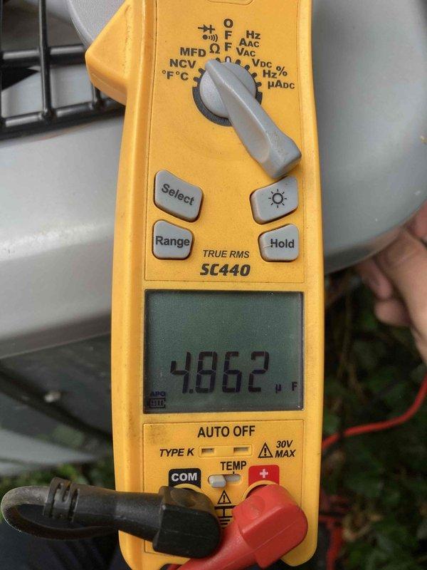 Responded to no cooling call where outdoor unit would not operate. Upon arrival, tested the run capacitor using a digital multimeter and confirmed capacitor failure with readings outside of acceptable range. The faulty capacitor prevented the compressor and condenser fan motor from starting, resulting in complete loss of cooling. Replaced defective run capacitor with properly rated component, restored power to unit, and verified normal operation of outdoor unit with compressor and fan motor running within specifications.