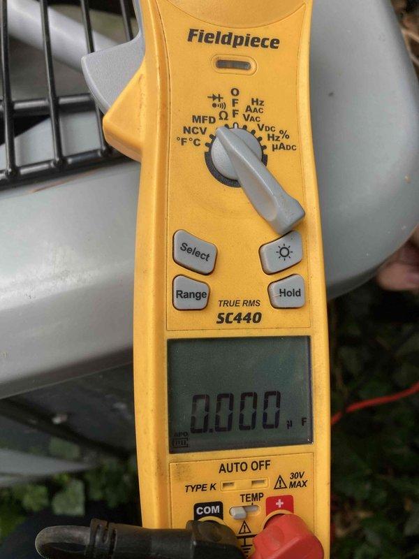 Responded to no cooling call where outdoor unit would not operate. Upon arrival, tested the run capacitor using a digital multimeter and confirmed capacitor failure with readings outside of acceptable range. The faulty capacitor prevented the compressor and condenser fan motor from starting, resulting in complete loss of cooling. Replaced defective run capacitor with properly rated component, restored power to unit, and verified normal operation of outdoor unit with compressor and fan motor running within specifications.