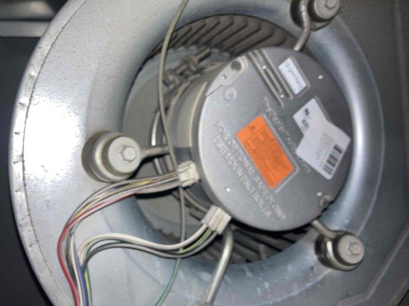 Completed preventive maintenance agreement visit for air conditioning system. Performed comprehensive inspection of blower motor assembly and capacitor components, documenting equipment condition with photos. Verified proper motor operation, checked electrical connections and wire integrity, confirmed capacitor specifications at 28+5 MFD, and assessed overall system functionality per maintenance agreement standards.