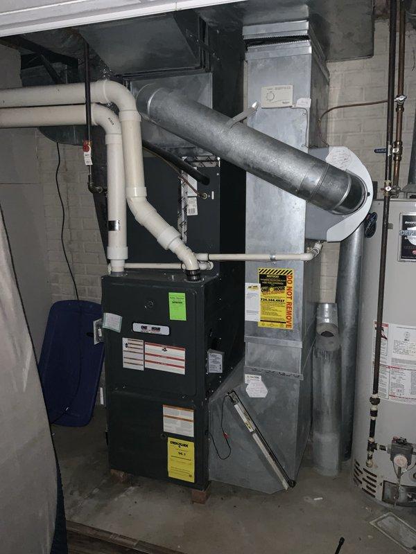 Performed comprehensive AC tune-up for new homeowner on Goodman HVAC system with age unknown. Completed full system inspection, cleaning, and preventive maintenance on air conditioning unit and furnace components, verified all electrical connections, checked refrigerant levels, inspected condensate drainage system and PVC piping, and confirmed proper airflow through ductwork. System found operating within normal parameters with no issues detected; all components left in proper working condition.