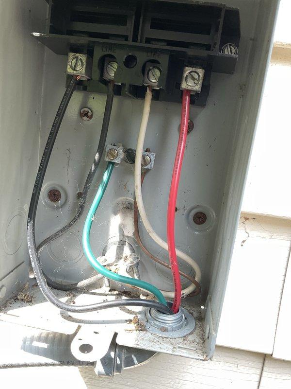 Completed preventive maintenance tune-up on air conditioning system under service code PTU AC10-239. Inspected ductwork components and electrical connections at junction box, finding minor dust accumulation and age-related weathering on terminal block and wiring but all connections secure and operational. System tested and verified functioning within normal parameters.