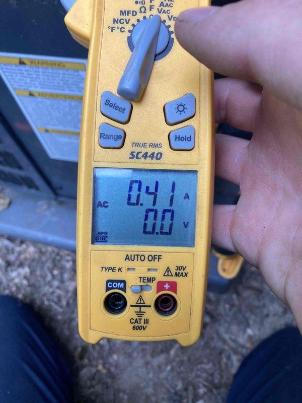 Completed routine AC maintenance tune-up on 2-year-old Goodman system. Performed comprehensive inspection of outdoor condensing unit, verified electrical measurements including amperage draw of 0.41A during operation and 3.10A inrush current, confirming normal operating parameters. All components found in proper working condition with no issues identified.