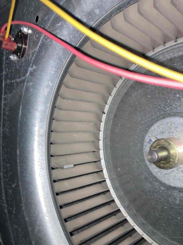Completed preventive maintenance agreement visit on residential air conditioning system under Club AC8-12 plan. Performed comprehensive system inspection including blower assembly evaluation and electrical diagnostics. Inspected squirrel cage blower wheel and motor assembly, confirming clean operation with minimal dust accumulation and proper blade alignment. Utilized digital multimeter to verify electrical parameters, recording voltage and amperage readings to ensure motor is operating within manufacturer specifications. All components functioning properly with no deficiencies noted at time of service.