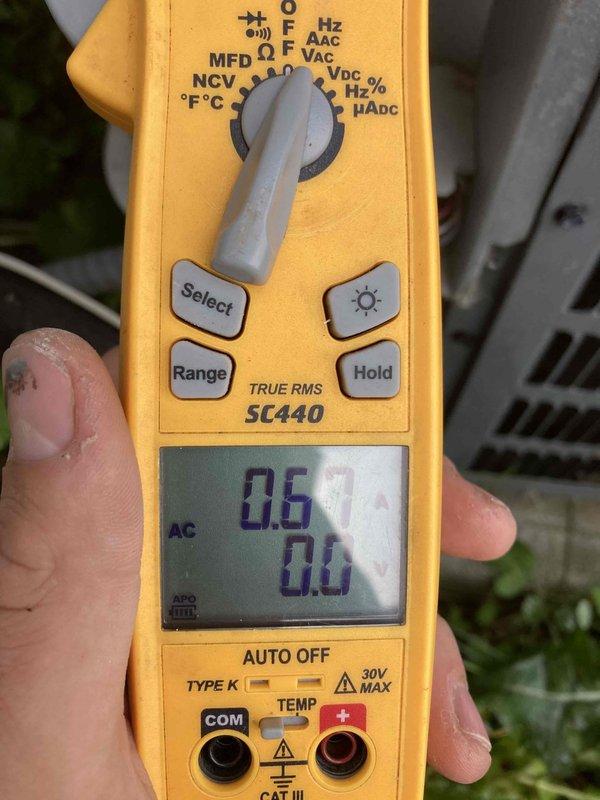 Completed preventive maintenance agreement visit on residential air conditioning system under Club AC8-12 plan. Performed comprehensive system inspection including blower assembly evaluation and electrical diagnostics. Inspected squirrel cage blower wheel and motor assembly, confirming clean operation with minimal dust accumulation and proper blade alignment. Utilized digital multimeter to verify electrical parameters, recording voltage and amperage readings to ensure motor is operating within manufacturer specifications. All components functioning properly with no deficiencies noted at time of service.