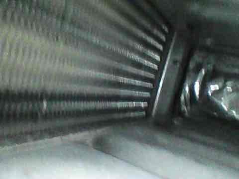 Completed routine maintenance tune-up on 8-year-old air conditioning system. Inspected and cleaned condenser coil fins, verified proper operation of compressor and fan motor, checked refrigerant levels, and tested all electrical connections. System operating within normal parameters with no issues identified.