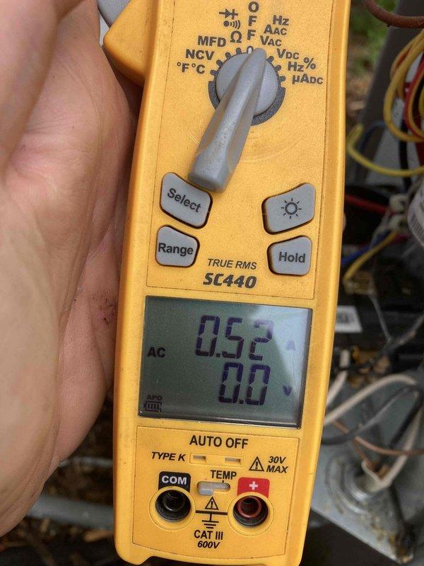 Completed preventive maintenance agreement visit on residential air conditioning system. Inspected blower assembly and documented significant dust and debris accumulation on blower wheel requiring cleaning to maintain proper airflow and system efficiency. Performed electrical diagnostics using digital multimeter to verify system operation and electrical parameters were within acceptable ranges.