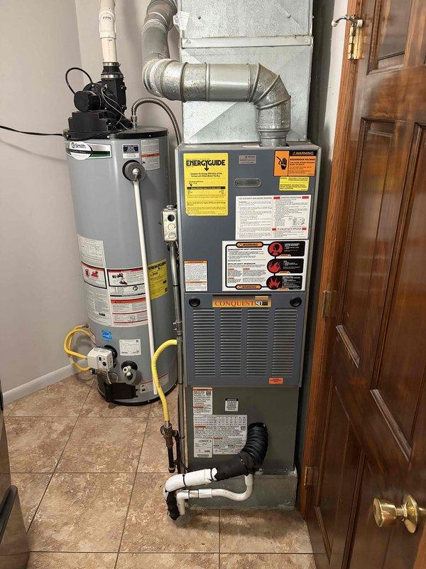 Completed installation of 2-ton air conditioning system with rear-mounted outdoor condenser unit as a mechanical-only reconnection project. Verified proper refrigerant charge levels with digital manifold gauges showing high-side pressure at 358 PSI and low-side pressure at 153 PSI, confirming system operation within manufacturer specifications. All equipment connections secured, system commissioned, and operational testing completed successfully with financing documentation processed through electronic signature platform.
