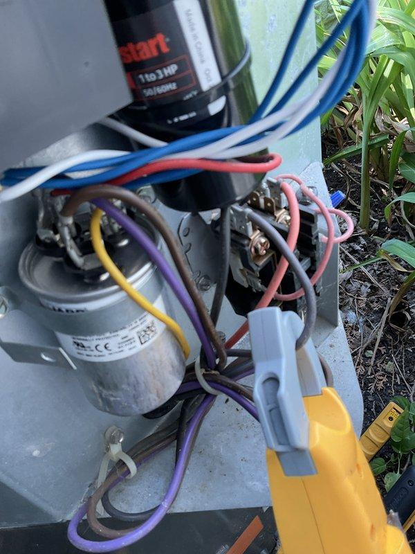 Completed routine maintenance inspection on outdoor AC condensing unit. Verified unit levelness using precision level tool and inspected electrical components including capacitor and associated wiring connections. All components found to be properly secured and functioning within normal parameters.