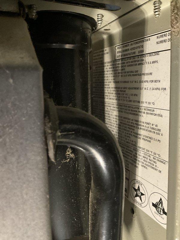 Responded to no cooling complaint with humming noise from outdoor unit. Upon inspection, found failed capacitor with visible corrosion at terminals and deteriorated refrigerant line insulation showing organic growth. Replaced defective capacitor, tested system operation, and restored cooling functionality.