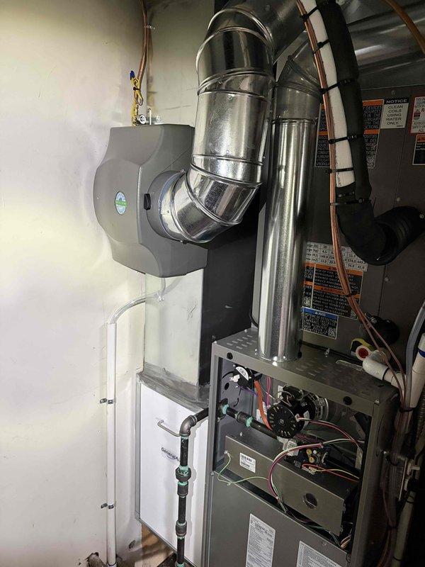 Completed warranty installation of humidifier unit on existing HVAC system. Integrated humidifier with furnace ductwork, established proper electrical connections, and verified operational functionality. All components tested and system confirmed working as designed.