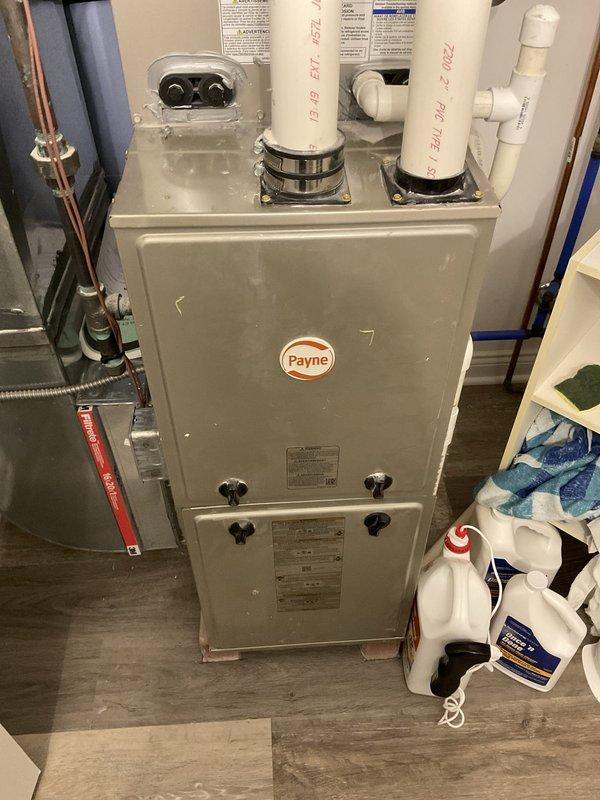 Completed electrical estimate for new whole home generator installation at a middle-unit condo. Evaluated existing electrical service configuration consisting of four digital meters serving the multi-unit building, assessed main electrical panel accessibility in utility closet adjacent to existing Payne HVAC furnace, and determined appropriate generator sizing requirements. Identified suitable installation location for generator unit, transfer switch placement, and necessary electrical connections to integrate with current electrical infrastructure while ensuring compliance with condo association requirements and local electrical codes for manufactured home applications.