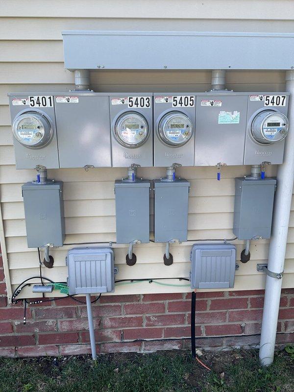 Completed electrical estimate for new whole home generator installation at a middle-unit condo. Evaluated existing electrical service configuration consisting of four digital meters serving the multi-unit building, assessed main electrical panel accessibility in utility closet adjacent to existing Payne HVAC furnace, and determined appropriate generator sizing requirements. Identified suitable installation location for generator unit, transfer switch placement, and necessary electrical connections to integrate with current electrical infrastructure while ensuring compliance with condo association requirements and local electrical codes for manufactured home applications.