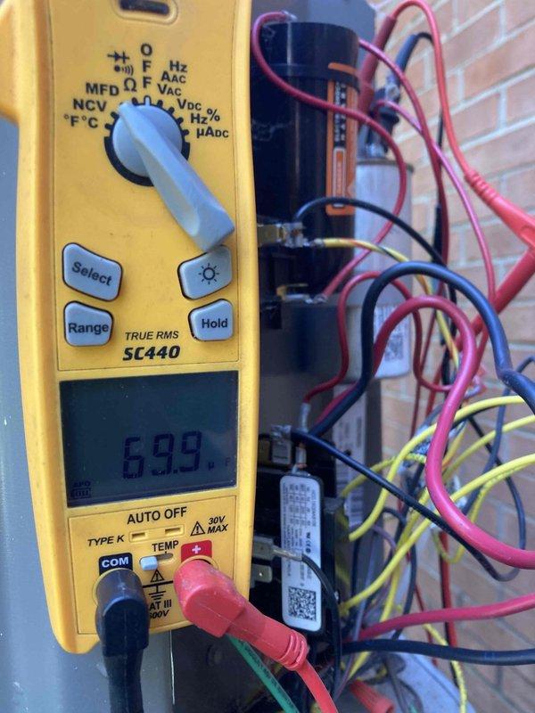 Completed routine AC tune-up on 7-year-old outdoor condensing unit. Performed electrical diagnostics using digital multimeter to verify system voltage and amperage readings across contactor and capacitor terminals. All electrical components tested within normal operating parameters. Cleaned both interior and exterior surfaces of unit as requested, including condenser coil fins and electrical compartment. System operating efficiently with no issues found during inspection.