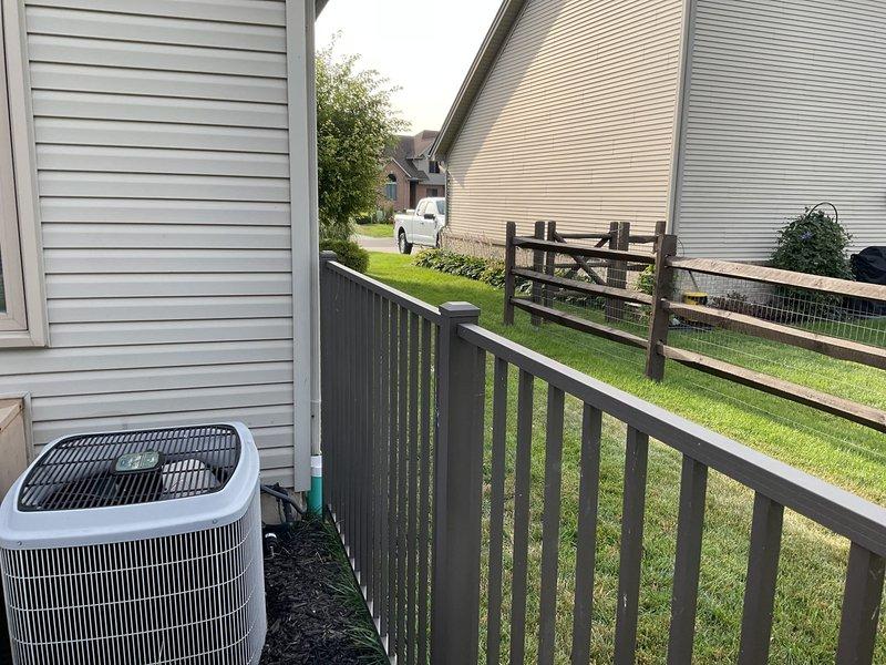 Conducted comprehensive site assessment for new whole home generator installation at residential property. Evaluated electrical panel location in laundry room and identified optimal generator placement location in backyard area adjacent to existing HVAC condenser unit. Documented existing electrical infrastructure, assessed load requirements, and determined necessary transfer switch specifications for seamless integration with home electrical system.
