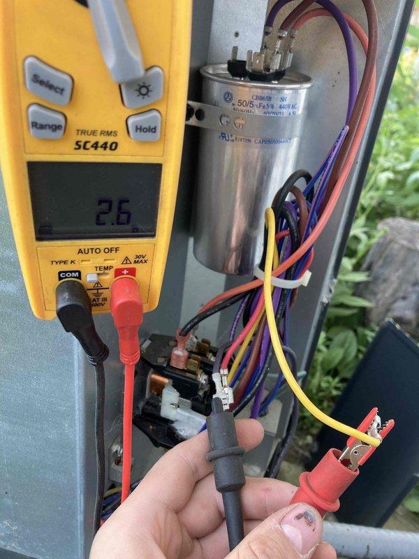 Completed prepaid maintenance visit on residential air conditioning system. Performed comprehensive tune-up including electrical testing of dual-run capacitor using digital multimeter, verifying proper microfarad readings and voltage specifications of 50/5 MFD at 370-440VAC. Inspected all electrical connections, contactor operation, and wiring integrity at outdoor condensing unit. System operating within normal parameters with no deficiencies noted. All components tested and found functioning properly. Unit ready for cooling season operation.
