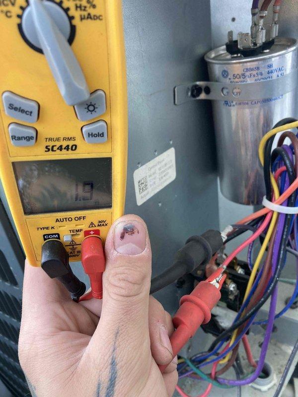 Completed prepaid maintenance visit on residential air conditioning system. Performed comprehensive tune-up including electrical testing of dual-run capacitor using digital multimeter, verifying proper microfarad readings and voltage specifications of 50/5 MFD at 370-440VAC. Inspected all electrical connections, contactor operation, and wiring integrity at outdoor condensing unit. System operating within normal parameters with no deficiencies noted. All components tested and found functioning properly. Unit ready for cooling season operation.