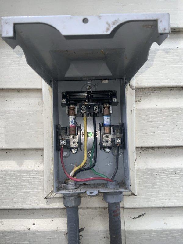 Responded to no cooling complaint on residential air conditioning system over 10 years old. Upon arrival, discovered large refrigerant line had been damaged by lawn service equipment, resulting in complete refrigerant loss. Inspected electrical disconnect box and confirmed power supply intact with all fuses operational. Examined condenser unit and noted accumulated debris on coil fins requiring cleaning. Replaced damaged refrigerant line section, pressure tested system for leaks, evacuated to proper vacuum levels, and recharged with manufacturer-specified refrigerant quantity. Cleaned condenser coil to restore proper airflow and heat transfer efficiency. System restored to normal cooling operation with proper temperatures and pressures confirmed at startup.