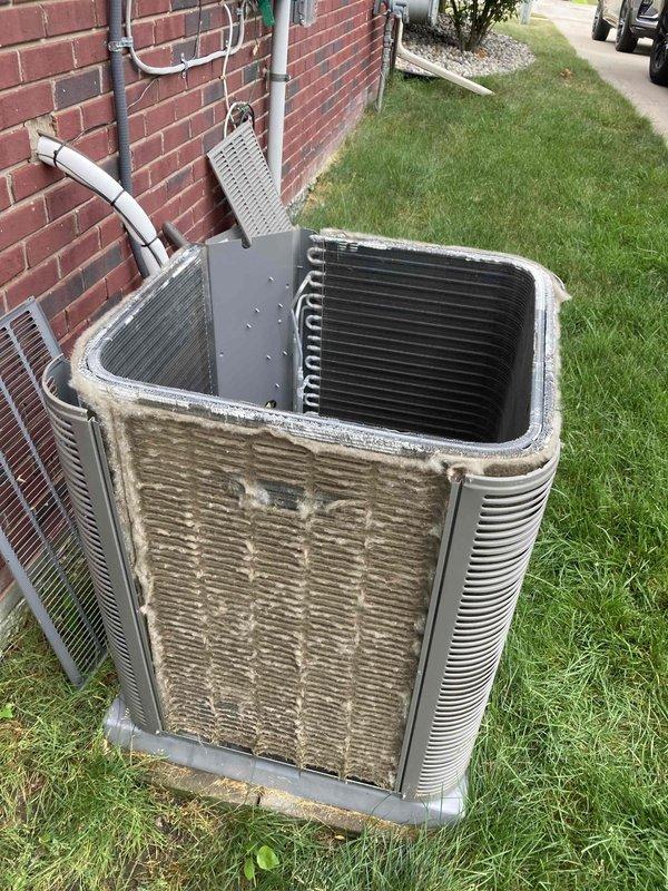 Completed comprehensive heating and cooling tune-up on a 2-year-old residential HVAC system with no reported operational issues. Performed thorough inspection of outdoor condenser unit, which showed moderate dirt accumulation on exterior grille panels and coils; cleaned and serviced unit as needed. Inspected indoor blower motor assembly, verified electrical connections, and confirmed all mechanical components were functioning properly within manufacturer specifications.