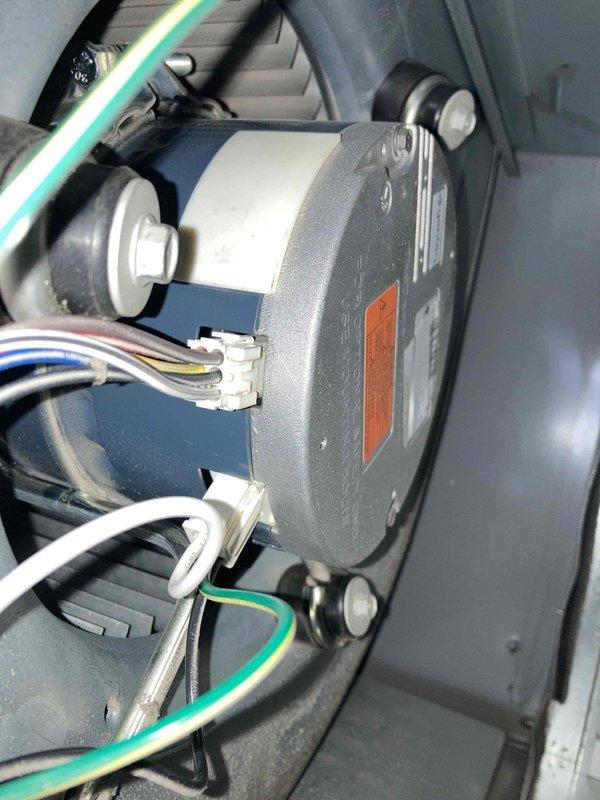 Completed comprehensive heating and cooling tune-up on a 2-year-old residential HVAC system with no reported operational issues. Performed thorough inspection of outdoor condenser unit, which showed moderate dirt accumulation on exterior grille panels and coils; cleaned and serviced unit as needed. Inspected indoor blower motor assembly, verified electrical connections, and confirmed all mechanical components were functioning properly within manufacturer specifications.