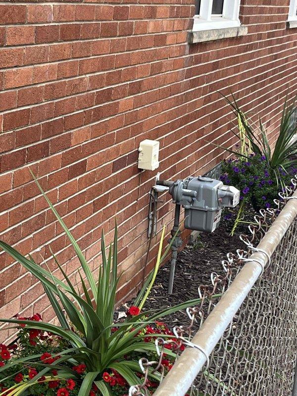 Responded to a no cooling complaint on a 10-year-old residential air conditioning system where the outdoor fan was spinning but no airflow was present inside the home after the unit had been off for 1.5 days. Conducted a comprehensive system evaluation of both the outdoor condensing unit and indoor air handling components. Assessed the outdoor unit condition, electrical connections, refrigerant circuit, and compressor operation while documenting the existing equipment installation and associated plumbing infrastructure. Provided the customer with a detailed estimate for complete HVAC system replacement due to the age and condition of the existing equipment.