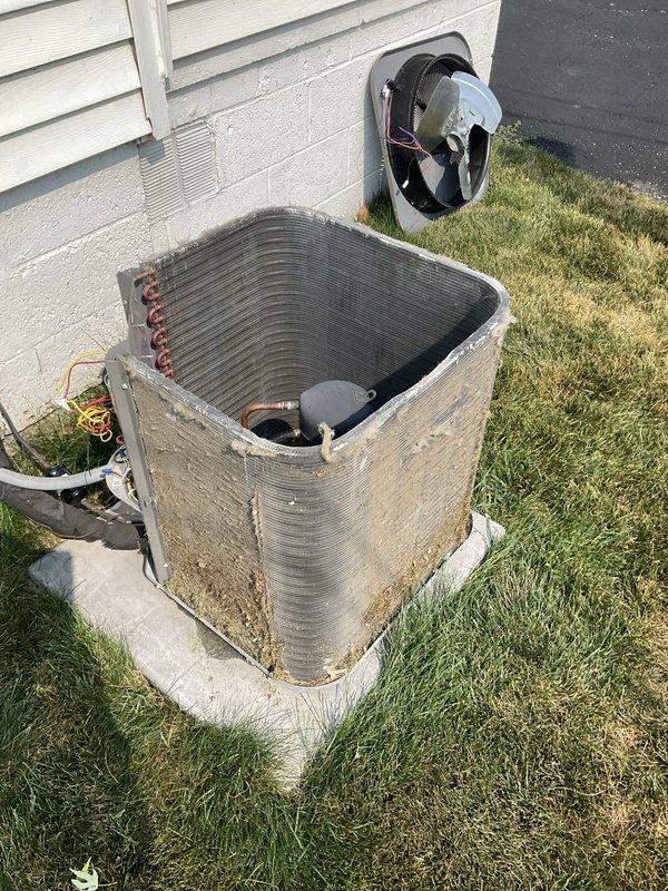 Completed yearly preventative maintenance on two outdoor air conditioning condenser units, both approximately four years old. Performed comprehensive tune-up including removal of top panels for internal inspection, visual assessment of condenser coils and refrigerant lines, and evaluation of compressor components. Both units showed normal wear consistent with age and outdoor exposure, with minor dirt accumulation on coils and casings; no mechanical issues identified and systems operating within normal parameters.