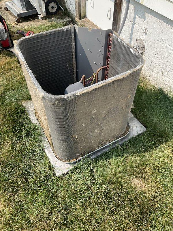 Completed yearly preventative maintenance on two outdoor air conditioning condenser units, both approximately four years old. Performed comprehensive tune-up including removal of top panels for internal inspection, visual assessment of condenser coils and refrigerant lines, and evaluation of compressor components. Both units showed normal wear consistent with age and outdoor exposure, with minor dirt accumulation on coils and casings; no mechanical issues identified and systems operating within normal parameters.
