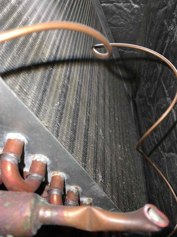 Responded to no cooling complaint on 9-year-old central air conditioning system with intermittent operation and repeated fuse failure. Upon arrival, diagnosed electrical fault causing compressor circuit to trip protection device, resulting in loss of cooling capacity while blower motor continued to operate intermittently. Inspected evaporator coil assembly and blower wheel for debris accumulation and airflow restrictions. Examined refrigerant line connections and condenser coil for potential issues contributing to system failure. Tested electrical components, replaced failed fuse, and verified proper amperage draw across all circuits. System restored to normal cooling operation with all components functioning within manufacturer specifications.