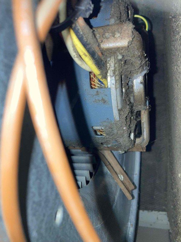 Performed comprehensive AC tune-up with deep cleaning on system 3910-2. Thoroughly cleaned heavily soiled blower motor, squirrel cage fan assembly, and surrounding ductwork components, removing significant dust and debris accumulation from all accessible surfaces. Inspected electrical connections, copper refrigerant lines, and motor mounting hardware to ensure proper operation and system efficiency.