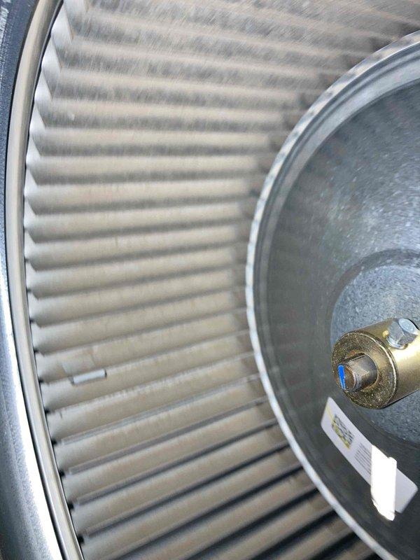Completed preventive maintenance agreement visit on club AC unit 4-6. Inspected and photographed blower assembly, confirming proper operation of squirrel cage blower wheel and motor mounting hardware. Measured operating amperage at 94.3 amps AC using digital multimeter, verifying system is running within normal parameters. All components found in satisfactory working condition with no deficiencies noted.