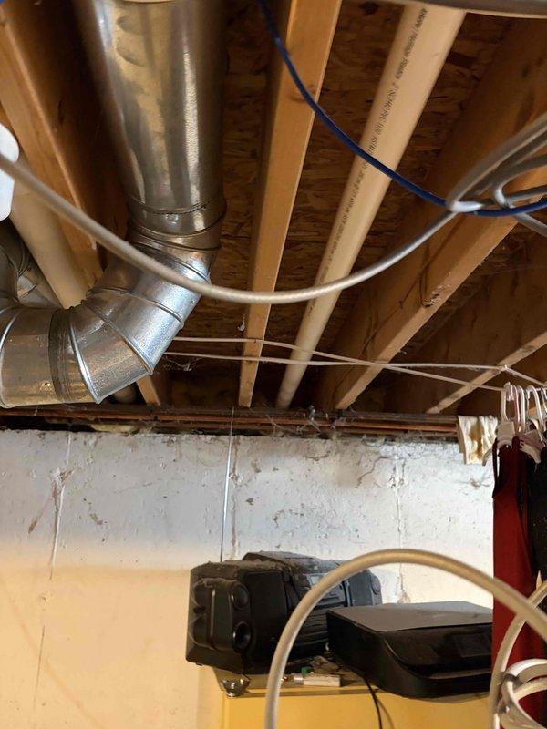 Completed full HVAC system installation including a 70,000 BTU gas furnace, whole-home humidifier, and 2.5-ton air conditioning unit with rear discharge configuration. Installed all mechanical and electrical connections, ran new ductwork through existing ceiling joists with proper insulation clearances, and reconnected all utility services including gas lines with shut-off valves, electrical supply with appropriate disconnect, and condensate drainage. System tested and verified operational upon completion.