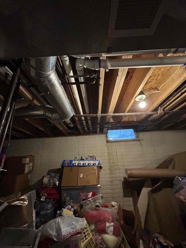 Completed full mechanical system installation including a 90,000 BTU furnace with humidifier and 3-ton air conditioning condenser unit configured for right-side installation. All ductwork, refrigerant lines, condensate drainage, and electrical connections were installed per manufacturer specifications, with the outdoor condenser positioned on grade-level pad and indoor equipment installed in basement utility area. System was tested, charged, and verified operational with all electrical reconnections completed.