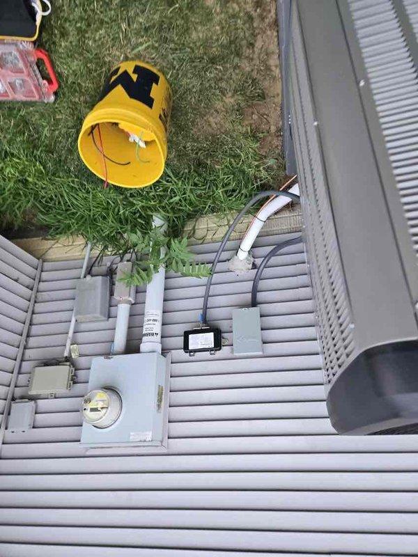 Completed full mechanical system installation including a 90,000 BTU furnace with humidifier and 3-ton air conditioning condenser unit configured for right-side installation. All ductwork, refrigerant lines, condensate drainage, and electrical connections were installed per manufacturer specifications, with the outdoor condenser positioned on grade-level pad and indoor equipment installed in basement utility area. System was tested, charged, and verified operational with all electrical reconnections completed.