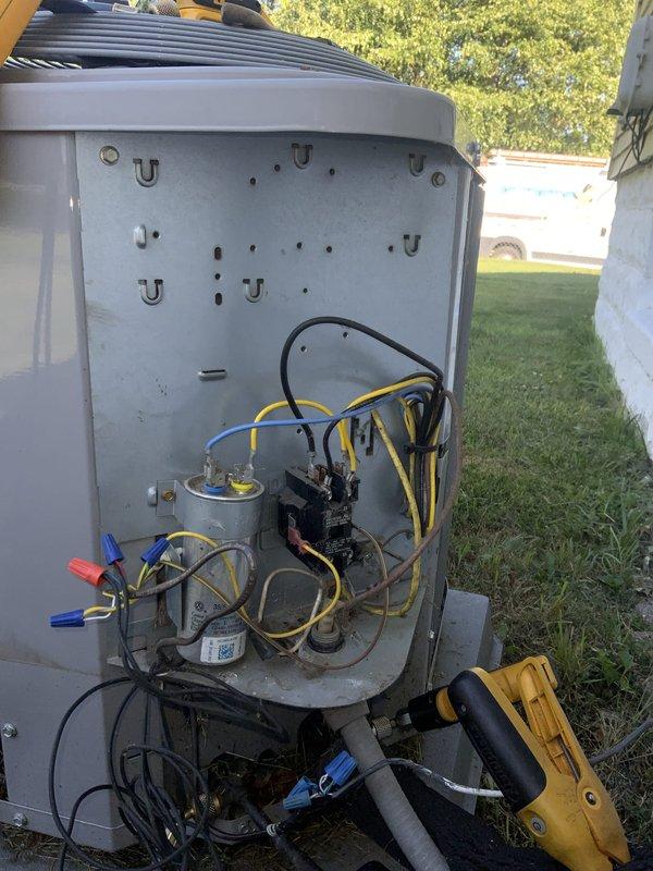 Responded to no cooling complaint affecting entire home. Upon arrival, performed diagnostic evaluation of outdoor air conditioning unit and indoor air handler. Removed access panels and inspected electrical components including capacitor, contactor, and control board connections. Used multimeter to test voltage and continuity across system components. Verified all wire connections at control board and electrical terminals were secure. Inspected capacitor for proper function and checked contactor operation. Examined control board for signs of failure or damage. All components tested within normal operating parameters with no defects found. System restored to normal cooling operation.