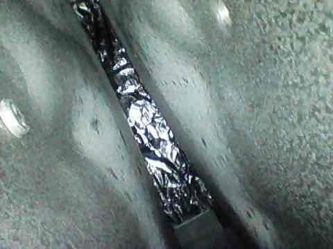 Completed routine AC maintenance visit under Club AC10-2 agreement. During inspection, discovered significant deterioration and cracking on refrigerant line insulation and ductwork components, with visible charring and material degradation that could compromise system efficiency and potentially lead to refrigerant loss. Documented damage with photos for customer review and recommended repairs to prevent further system deterioration.