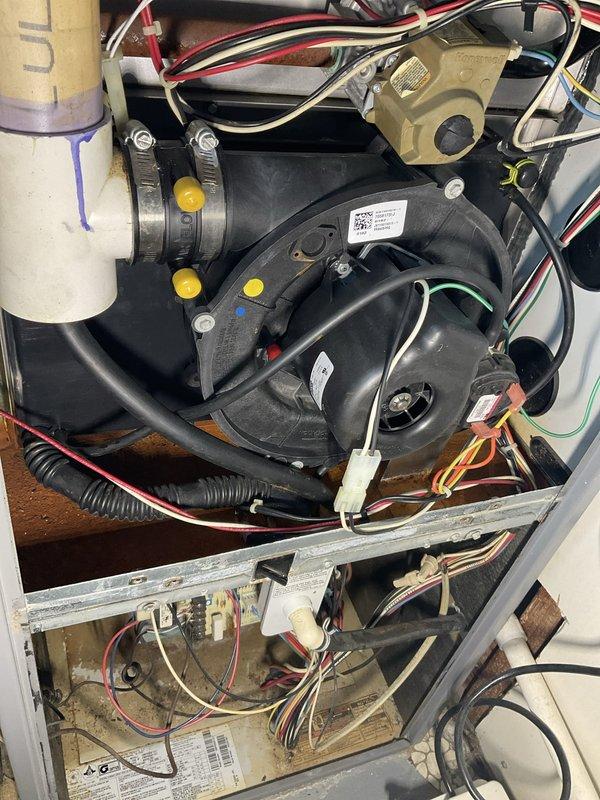 Completed city inspection 12-4289 on residential HVAC system. Performed comprehensive interior component inspection with access panel removed, documenting blower assembly, motor operation, electrical connections, and drain line configuration. Utilized thermal imaging equipment to assess system performance and identify potential issues within ductwork and mechanical components.