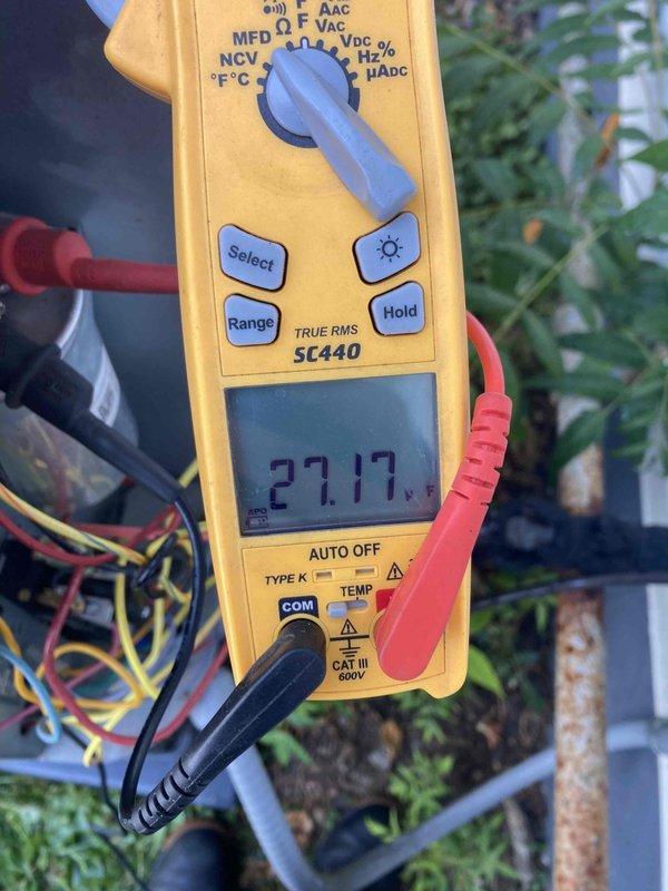 Completed preventive maintenance tune-up on HVAC system. Performed electrical diagnostics using digital multimeter, verifying amperage draw at 27.17A and measuring inrush current at 1.7A to confirm proper compressor operation and electrical performance. All system parameters tested within manufacturer specifications, ensuring optimal efficiency and reliability for continued operation.