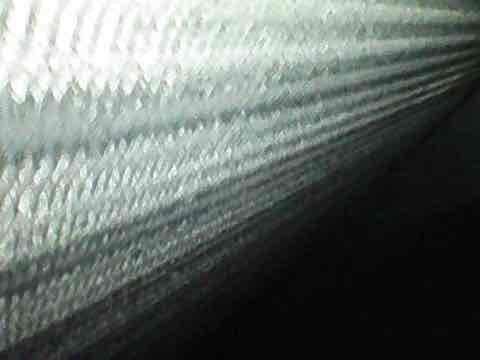 Completed preventive maintenance inspection under CLUB AC 12-4 agreement. Condenser coil exhibited significant buildup of white crystalline deposits and debris accumulation between fins, restricting airflow and reducing heat transfer efficiency. Thoroughly cleaned and treated condenser coil to restore proper operation. Inspected ductwork components showing normal wear patterns with minor dust accumulation on corrugated surfaces.
