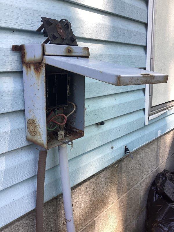Responded to Club AC service call for air conditioning unit not cooling. Upon arrival, performed comprehensive system inspection and found aged outdoor condenser unit with significant weathering and corroded disconnect box with extensive rust damage. Completed standard maintenance protocol including system diagnostics, verified electrical connections despite corroded disconnect housing, and assessed overall equipment condition. Unit operational following service visit.